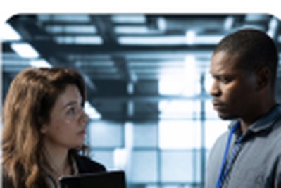 Two professionals discussing an IT partnership